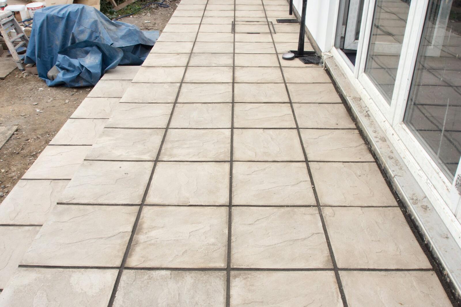 Freshly installed paving outside a building